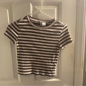 pink,black,and white striped cropped shirt